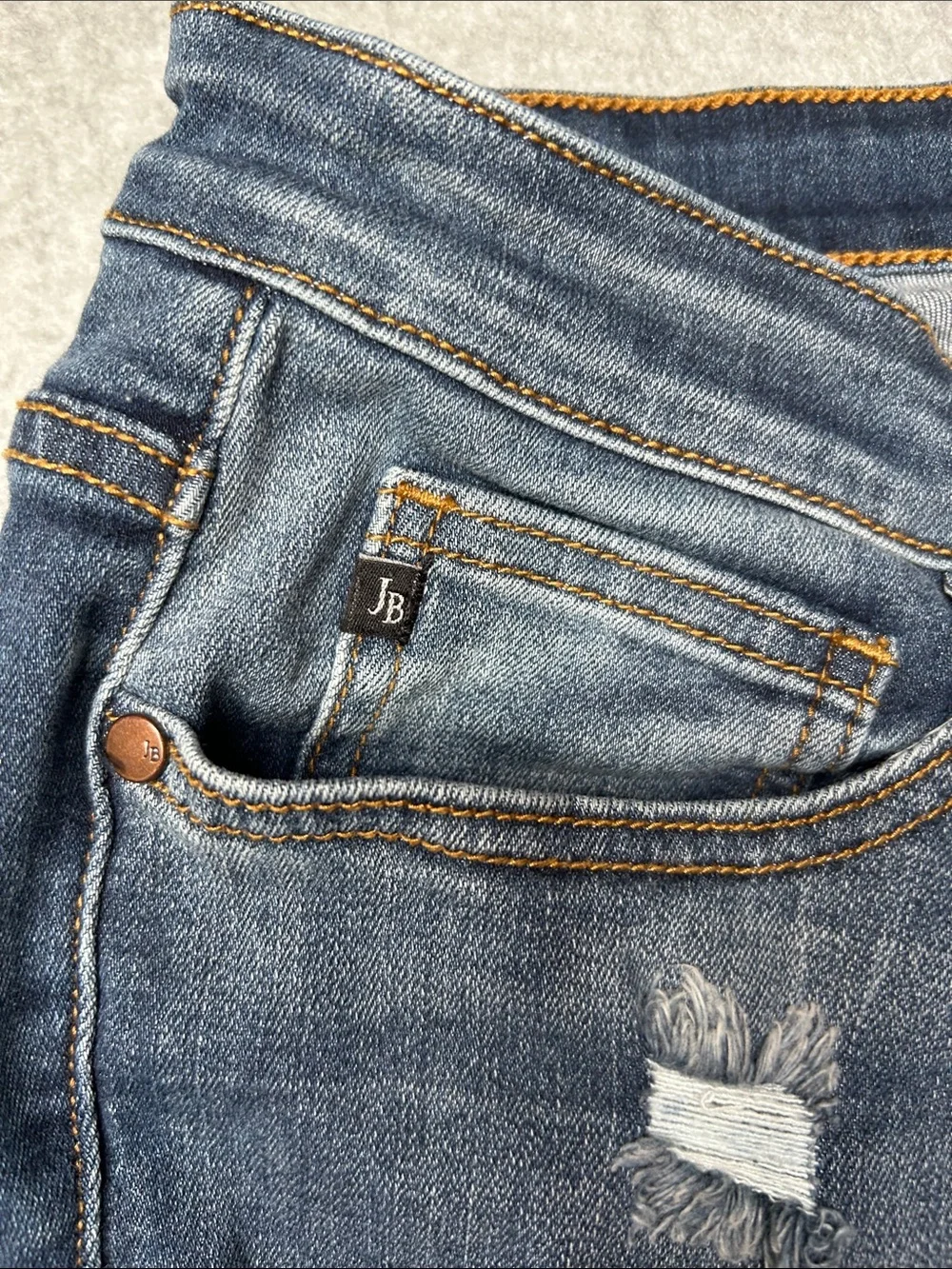 Judy Blue Distressed Jeans in Mid Blue with Red Patch Underlays‎